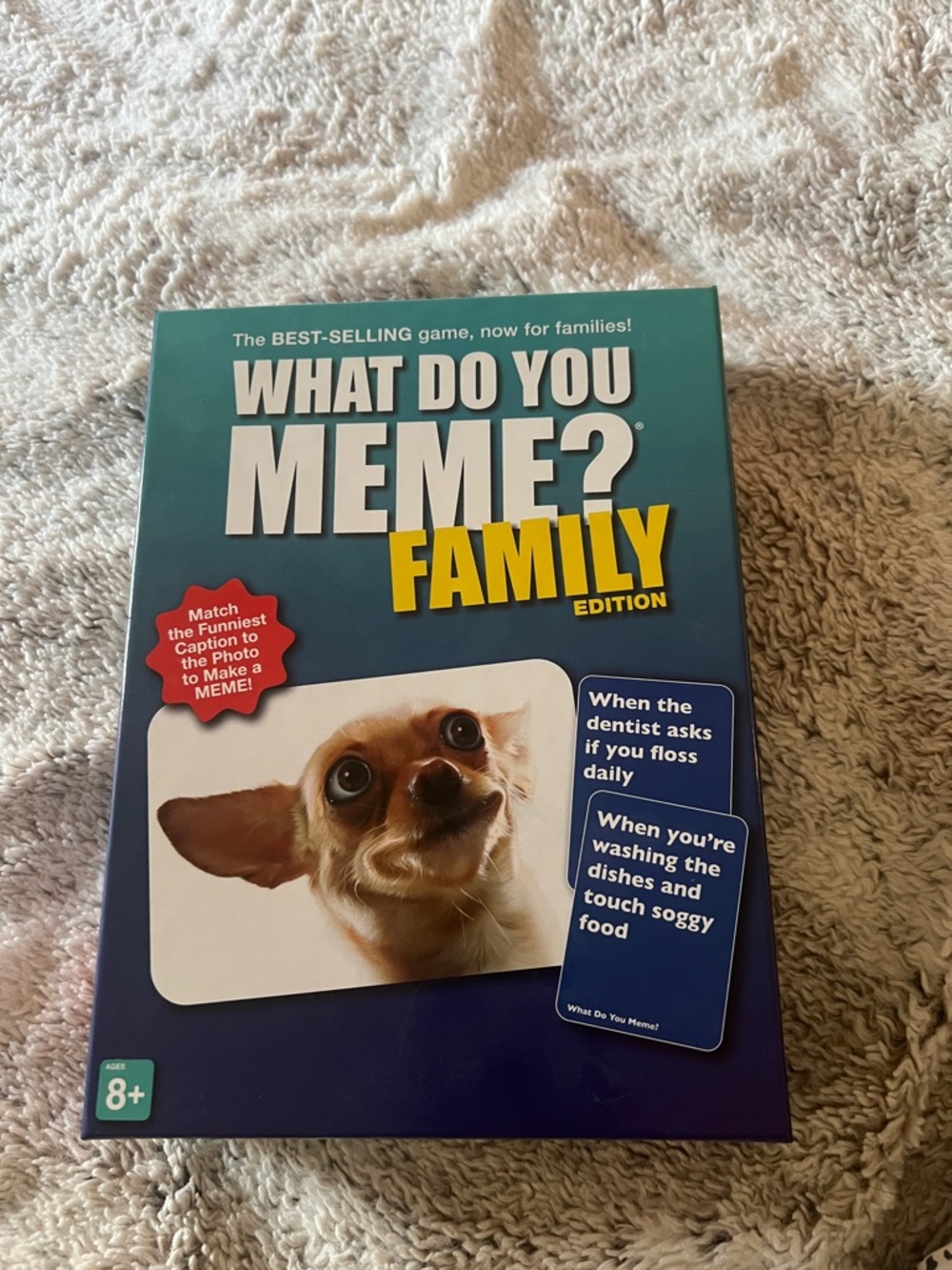 What Do You Meme? Family Edition Board Game - Teal & Navy Box